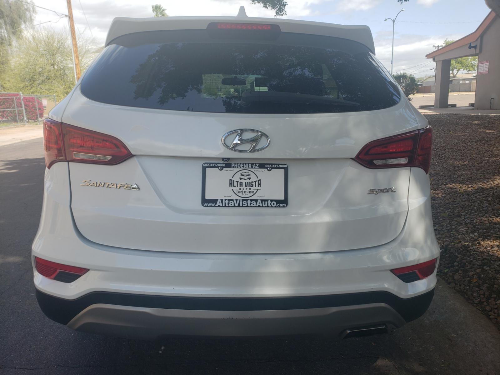 2017 WHITE /gray and black Hyundai Santa Fe SE sport (5NMZT3LB6HH) with an 2.4L L4 DOHC 16V engine, 4-Speed Automatic transmission, located at 323 E Dunlap Ave., Phoenix, AZ, 85020, (602) 331-9000, 33.567677, -112.069000 - 2017 Hyundai Santa Fe Sport,........A Must See!! No accidents, Ice cold AC. The SUV is gorgeous inside and out. Power windows, Power door locks, Touch screen Stereo/CD Player, Phone sync, Bluetooth, Backup camera, Beautiful gray and black interior with gray cloth seats in near perfect condition, Inc - Photo #7